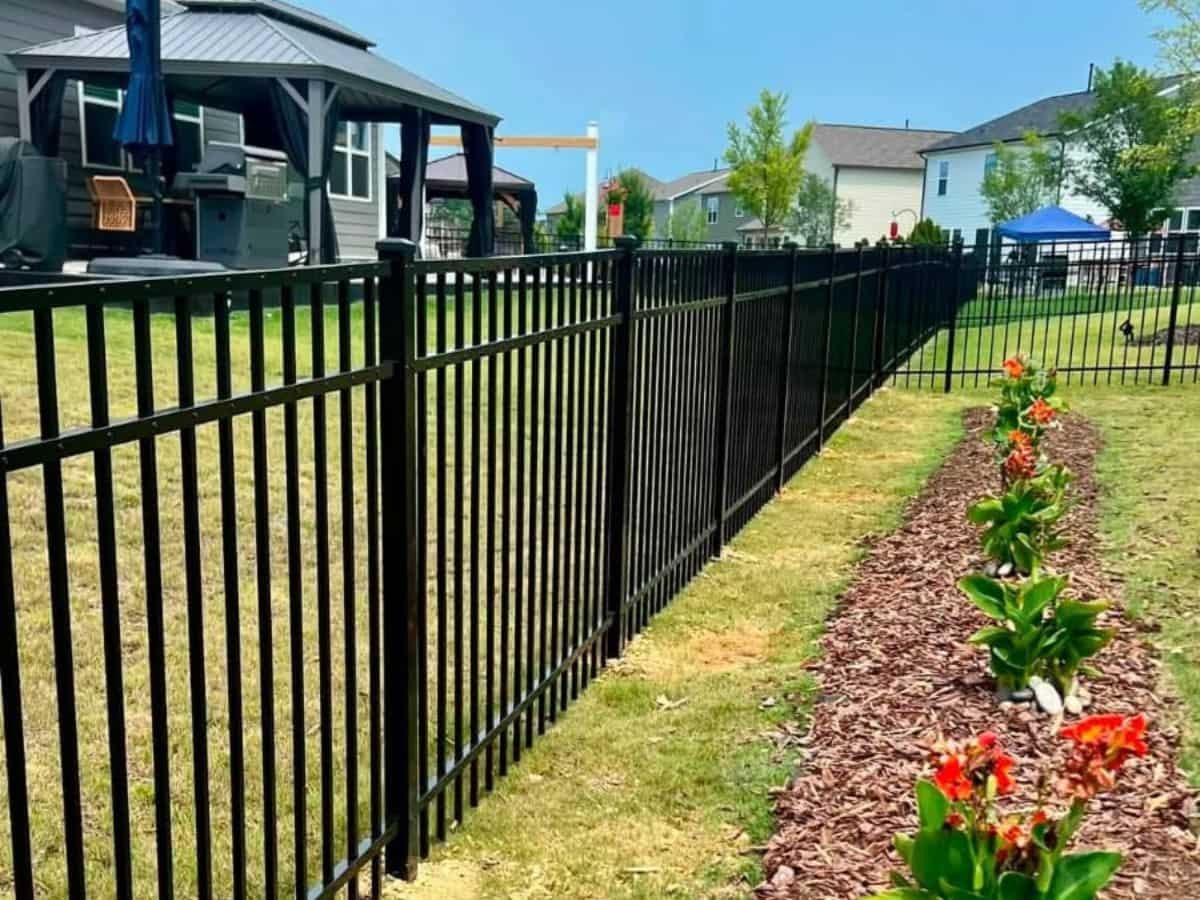 Black aluminum fence landscape Asheville NC by Brothers Fence Solutions