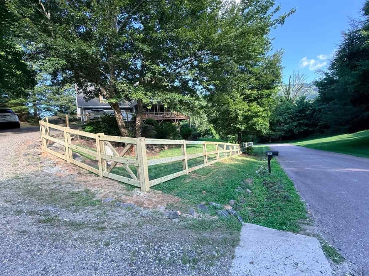 Split rail fence roadside Asheville NC by Brothers Fence Solutions